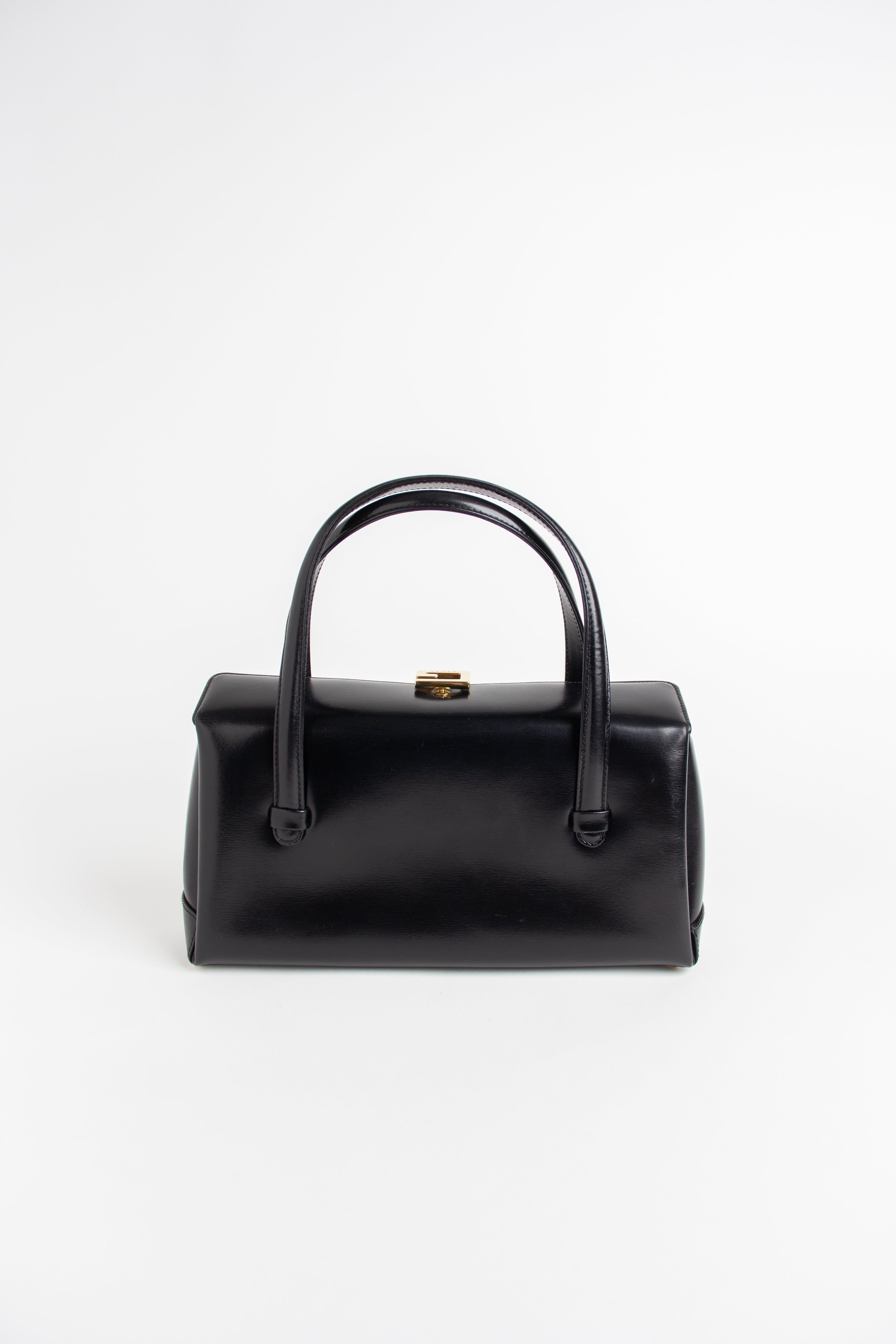 Gucci Vintage Black Top Handle G Clasp Bag