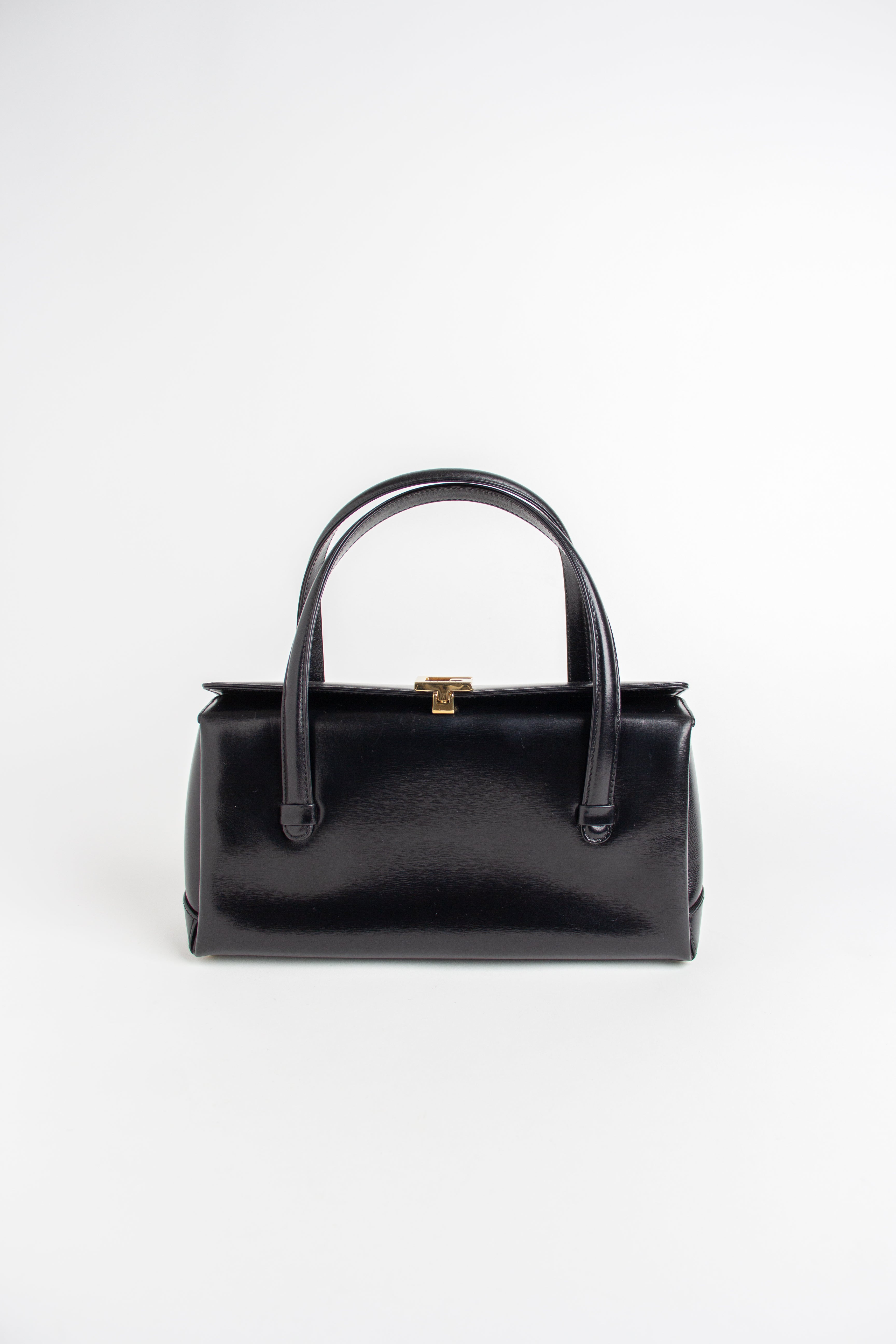 Gucci Vintage Black Top Handle G Clasp Bag