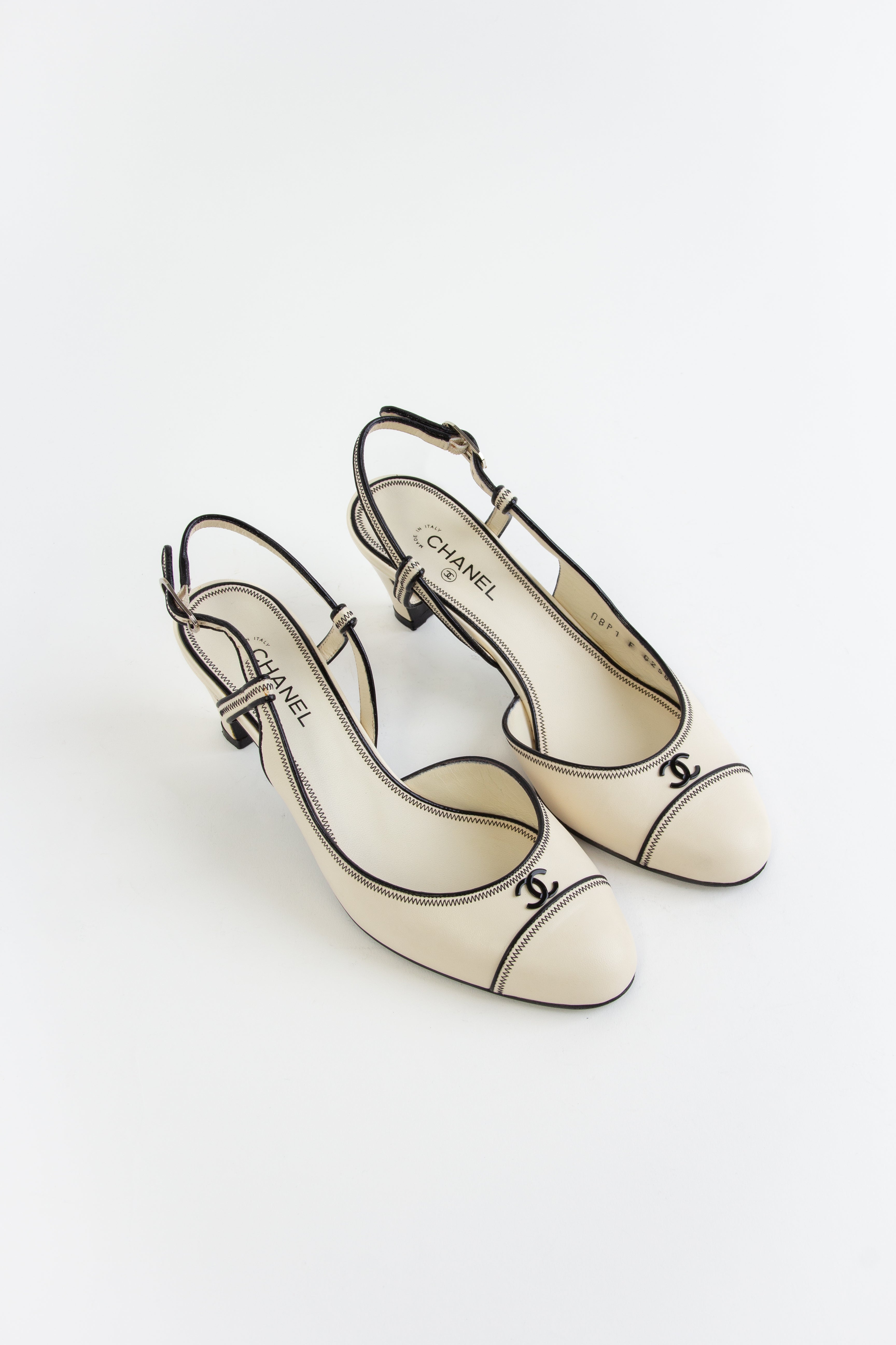 Rare Chanel Ivory + Black CC Slingback Heels (IT 37.5)